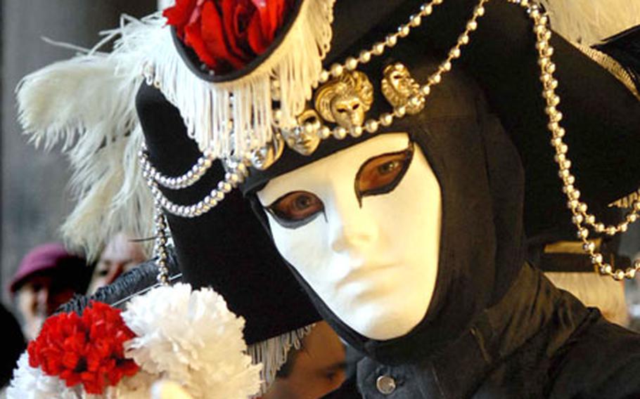 One of the many ornate costumed chracters of the Venice carnival.
