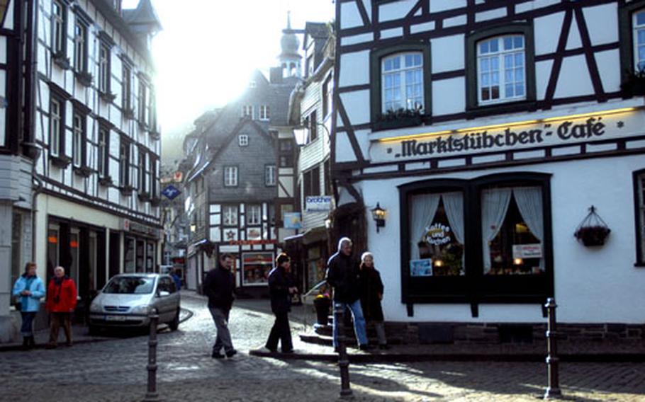 Market Square in Monschau’s old town district is encircled by half-timbered buildings, some of which date back 300 to 400 years.