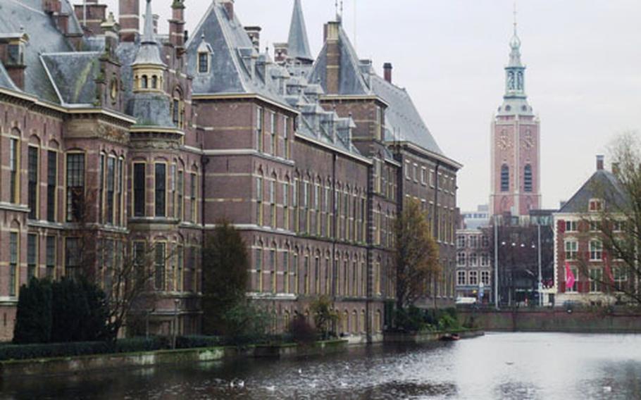 Parliament buildings line the shore of the Hofvijver, a small lake in the center of The Hague.