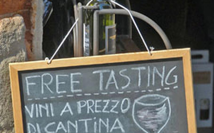 Signs like these are a familiar sight when traveling through the towns and vineyards of Tuscany.