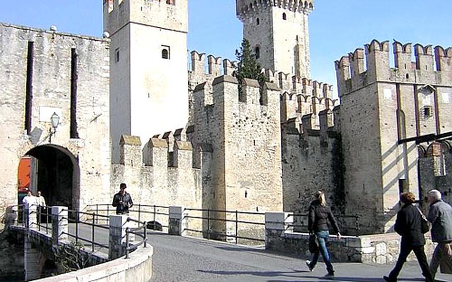 The ruins of the Roman villa known as the Grottoes of Cattulus cover a large area. Some of the ruins are marked by piles of rocks with a marker explaining what once stood there, but others include reconstructed towers. The small rooms and arcades of the lower sections, used to support the foundation for the living quarters, were overgrown with vegetation with the ruins were rediscovered, giving them their name.