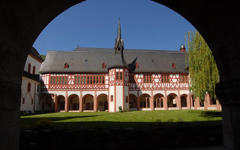 The view from one of the cloister arches at Kloster Eberbach shows the late-Gothic, half-timbered library. Today it houses the monastery museum.