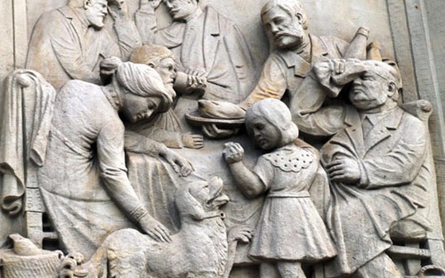 A relief on the façade of the Metz train station was created in the early 20th century when Metz was part of Germany. This panel indicates the entrance for first-class passengers as only they were allowed to travel with dogs.