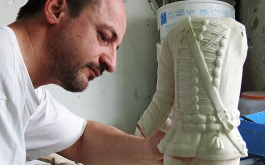 This faïence creation is being made at the Faïence Manufacturer of Lunéville-Saint Clement for a museum. All of the factory’s products are made by hand.