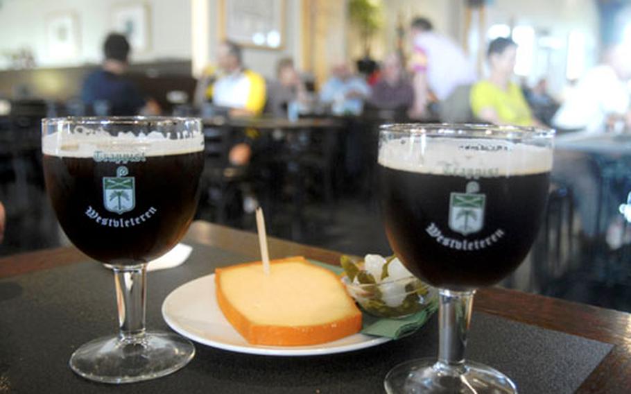 Glasses of the Abbey of Saint Sixtus’ famed 12 beer await tasting. The dark, creamy beer offers complex flavors, and packs a punch of 10.2 percent alcohol.