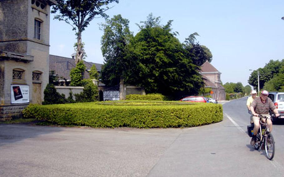 Cyclists pedal past the Abbey of Saint Sixtus of Westvleteren in Belgium, where five of its monks brew three types of beer. The monks make about 125,000 gallons of beer –— the same amount as in the 1940s when it capped its annual beer production.