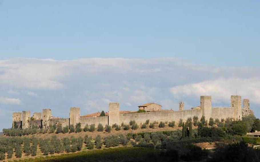 The old village of Monteriggioni is contained within its 13th-century walls with 14 square towers.