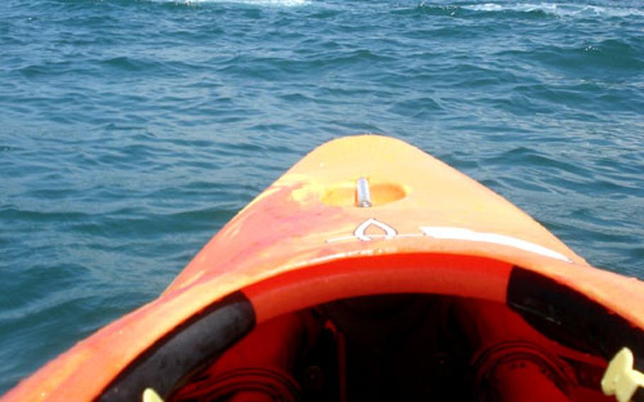 A bit of the town of Pozzuoli is visible across the bay from Baia, and makes for a pretty backdrop while kayaking.