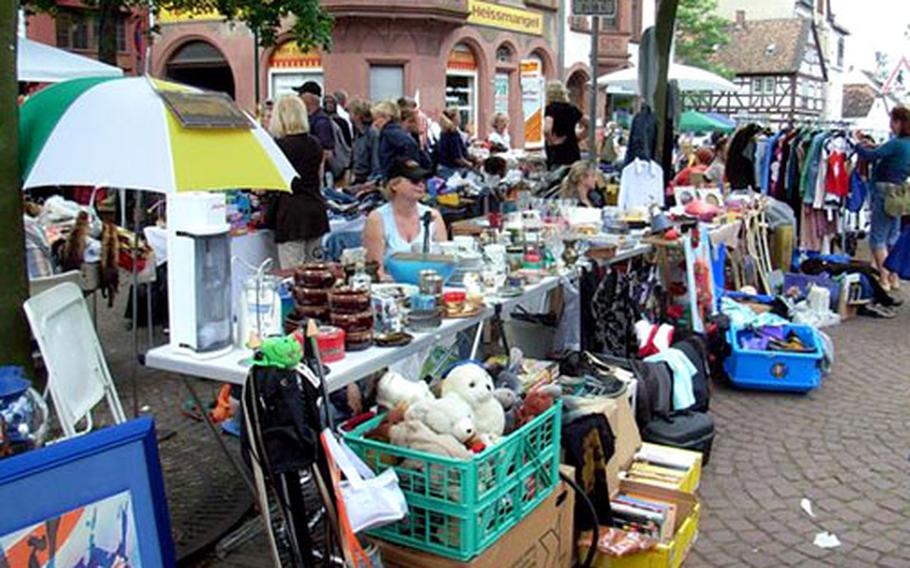 The market in Darmstadt, Germany, features some booths selling specific items and others selling a little bit of everything.