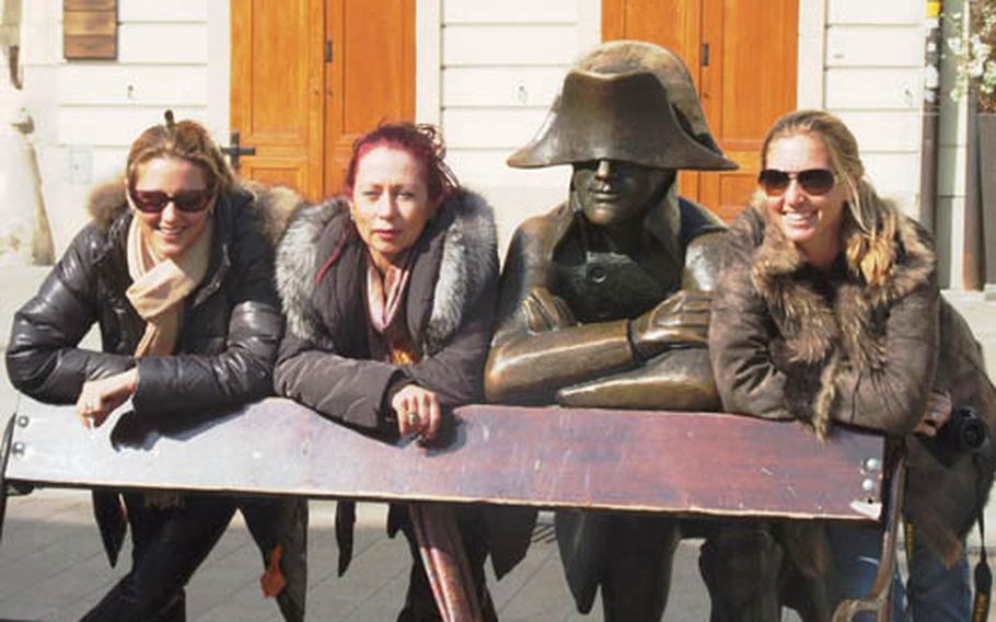 Wander through Bratislava and you’ll come upon fun and whimsical statues, such as this Napoleonic soldier leaning over a bench.Tourists love to pose next to him.