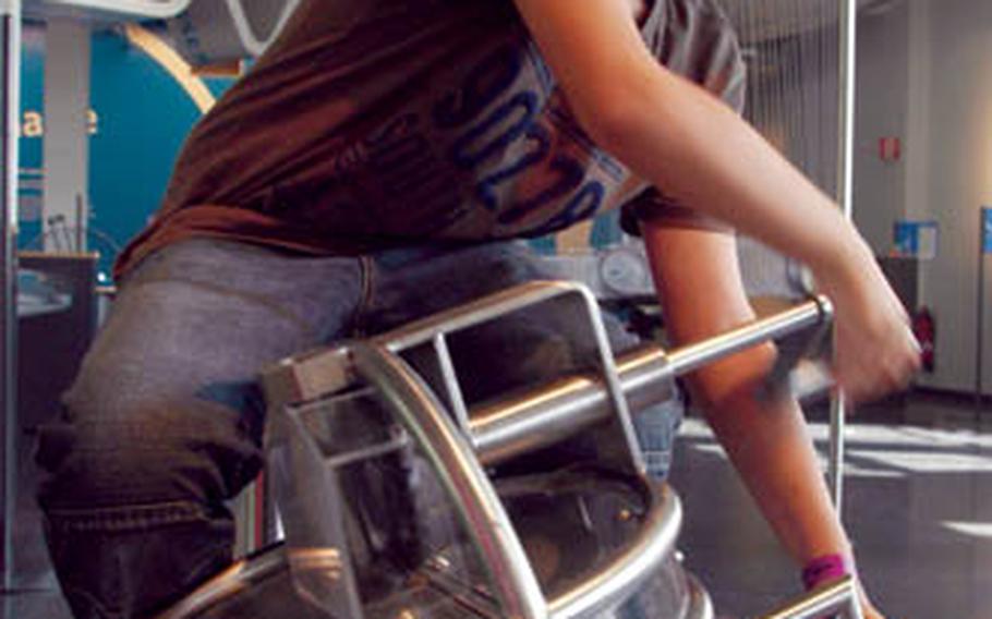 A student takes a wild ride as he tries to harness the momentum of a spinning gyroscope.