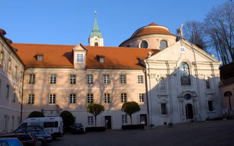 The courtyard of the Weltenburg Abbey gives litte hint of the baroque glories of the inside of the church, whose entrance is on the right. The abbey dates to the early seventh century, the church to the 18th.