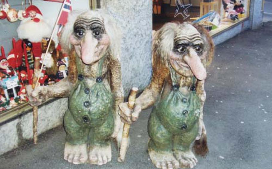 Most of Norway’s trolls are said to move about only at night. But this pair guards a souvenir shop in downtown Oslo, not far from the city’s Christmas market.