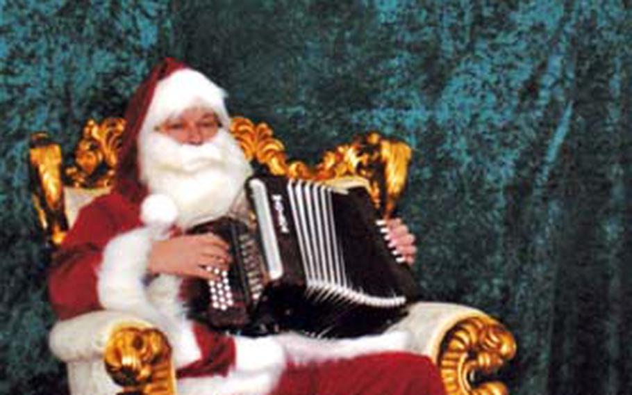 The Santa at Oslo’s Christmas market provides musical entertainment when he’s not conferring with the local children.