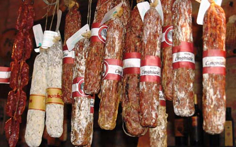 Wild boar salami, a specialty of the region, hangs in one of many shops peddling locally produced products from Montepulciano.