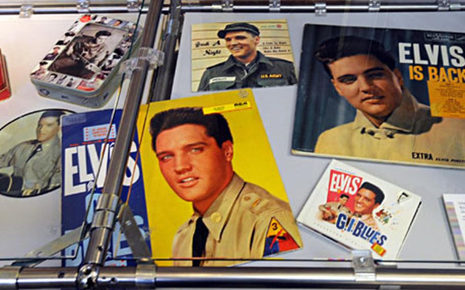 Record covers from songs Elvis Presley recorded during his military career. He could hear his own songs on American Forces Network radio while resting at home in Bad Nauheim, Germany.