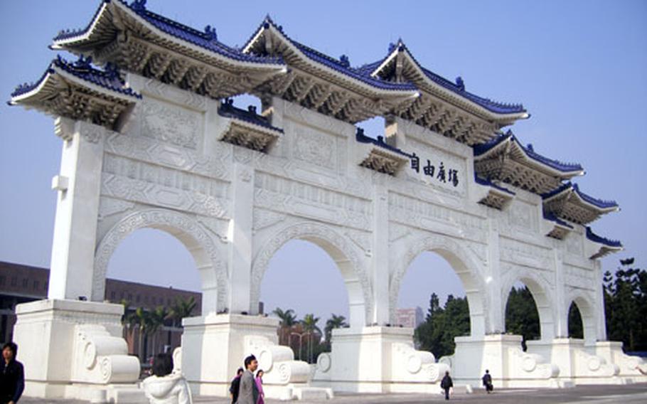 An ornate gate marks the entrance to Chiang Kai-shek Memorial Park, home to Memorial Hall, beautiful gardens, and two performing arts venues.