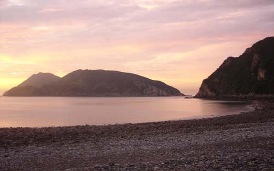 There are also some forests and a mountain peak. But the most beautiful vista comes at sunset on the island’s far end, where a beach covered in jagged, volcanic rock overlooks a few islets and a blazing sky full of orange and pink.