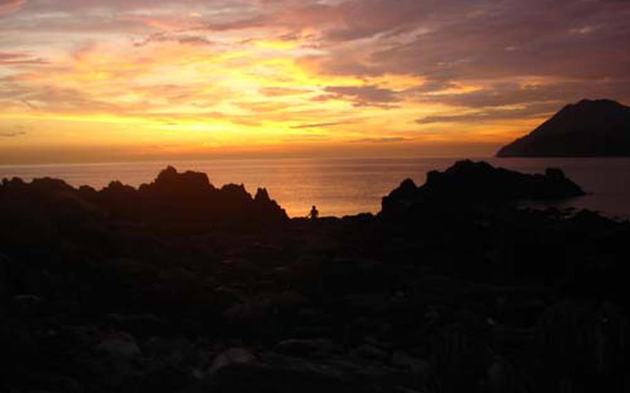 The sun sets over the secluded beach at Deokjeokdo&#39;s northern end. The South Korean island, reachable by ferry from Incheon, has several beaches and affordable hotels.