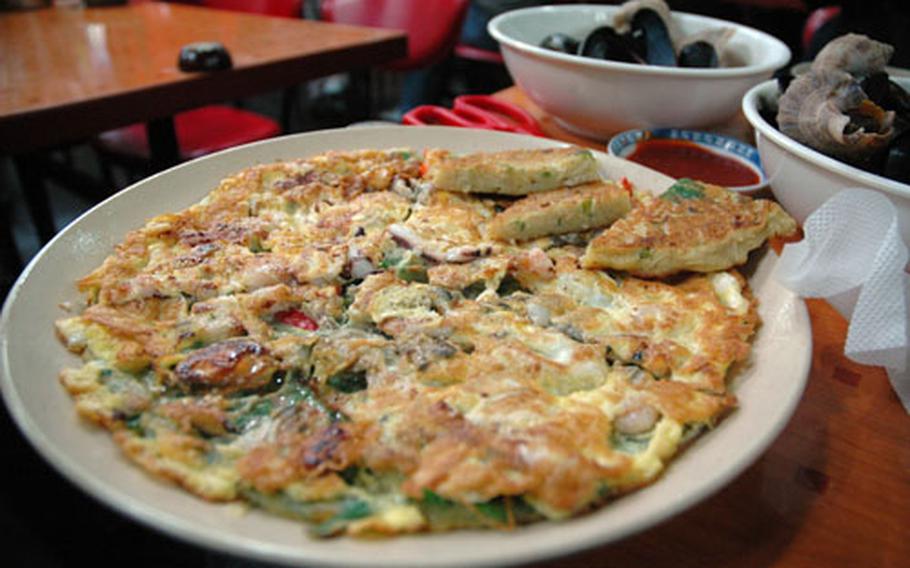 Seafood jeon is one of the more traditional types of pancake. Most Americans order fish or sesame leaf jeon, while Japanese tourists prefer ones with oysters. Koreans like mungbean, which fries up light and spongy, almost like a hash brown.