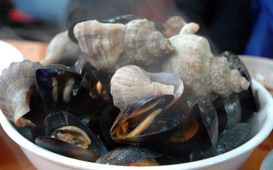 The restaurant has other dishes as well, including these steamed mussels and conches, which cost 6,000 won.
