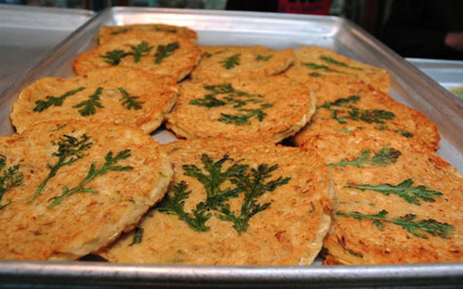 This is jeon: a savory pancake usually filled with onion, kimchi, mung bean or seafood. The restaurant Mapo Halmae Bindaeed Tteok in Seoul has become a destination for jeon and other fried foods. The eatery opened 30 years ago as a stall; now it&#39;s grown into a collection of rooms and counters all dedicated to frying.