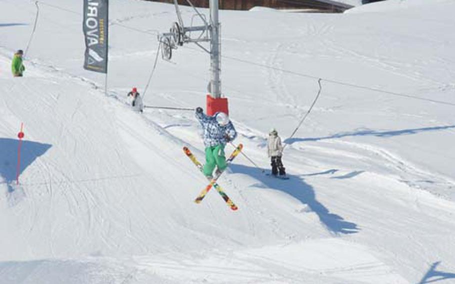 A skier peforms a "360 with Iron Cross" at Avioriaz on Presidents Day Weekend 2009. Avoriaz is on the French side of the Portes du Soleil ski area.