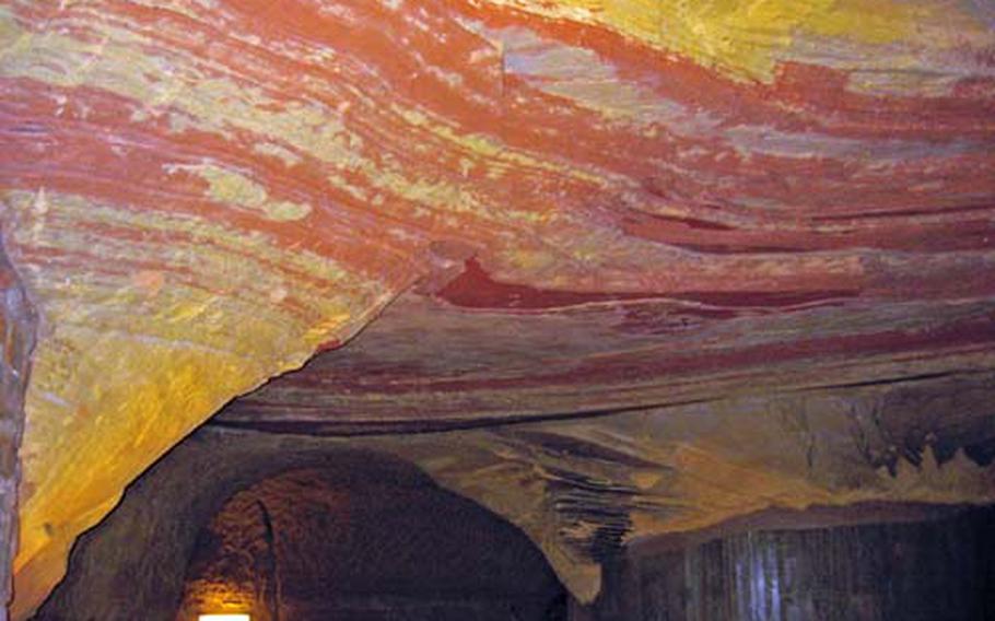 The Schlossberg Caves, whose creation dates as far back as the 11th century, are said to be Europe’s largest colored sandstone caves. Throughout their history, they have been used as defense, the storage of ammunition, lodging for troops, and an air-raid shelter during World War II.