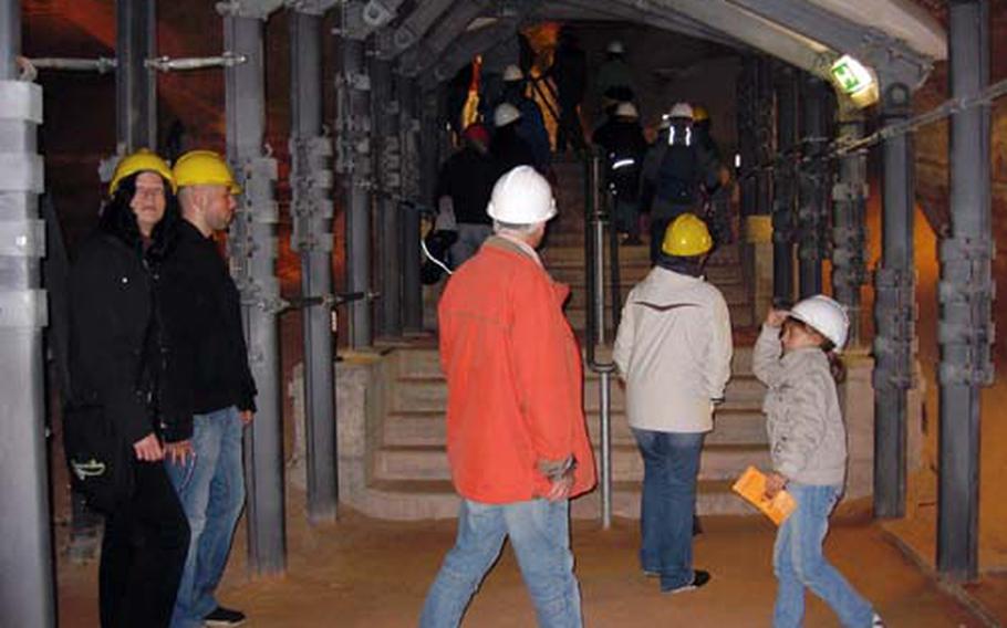 Hard hats and guided tours are mandatory during a visit to the Schlossberg Caves.