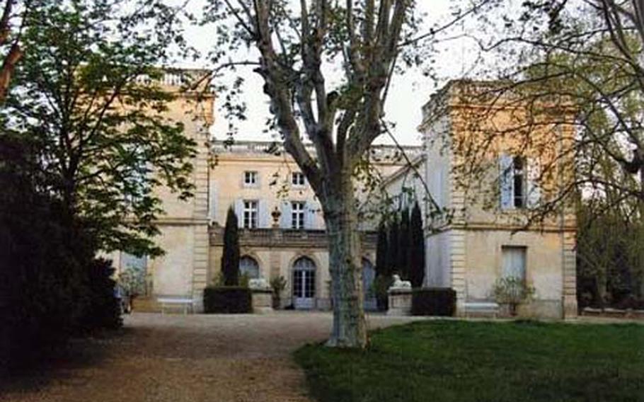 At their elegant chateau near Beziers, renowned artists Jean and Christine Viennet blend 200 years of family history with a taste for irreverent art and a thriving vineyard.