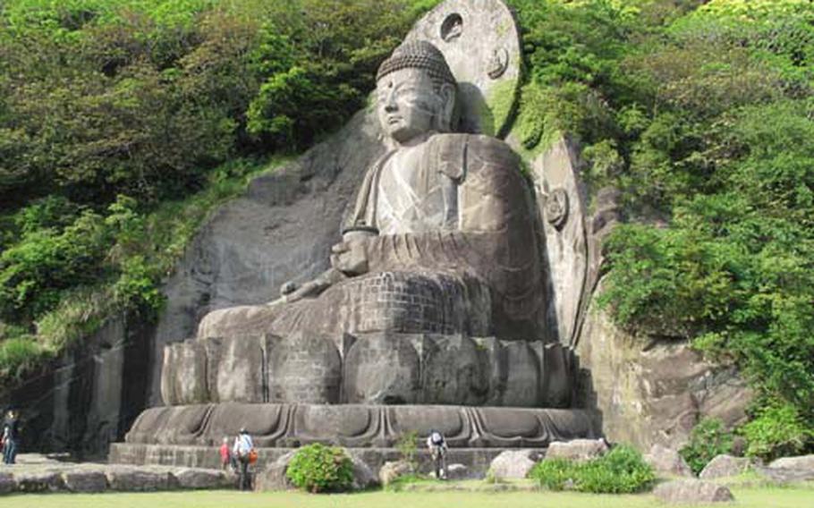 The diabutsu sits in the mountain side at the Nihon-ji Temple on Mount Nokogiri. The Buddha sits 90 feet tall and is one of the largest in the country.