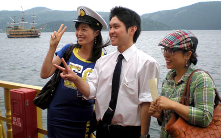 During the pirate ship cruise on Lake Asahi, two ladies pulled the first mate from his duties long enough to get a photo with him.