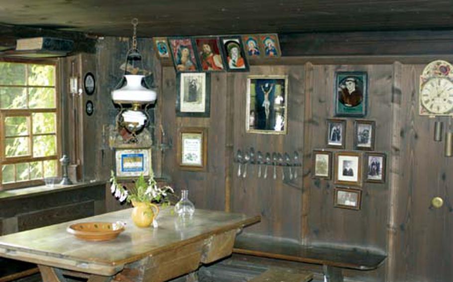 A room at the Hippenseppenhof in the Black Forest Open-Air Museum Vogtsbauernhof in Gutach, Germany, shows household goods of the farm’s inhabitants from throughout the years.
