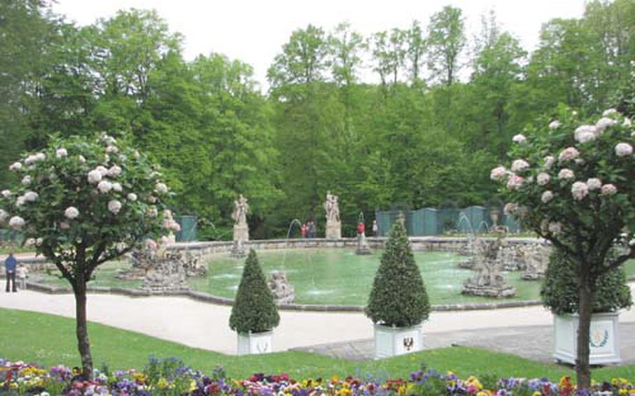 The grounds of the Hermitage on the outskirts of Bayreuth, Germany, feature elaborate pools, colorful gardens and lush landscaping. This pond is near the Sun Temple.