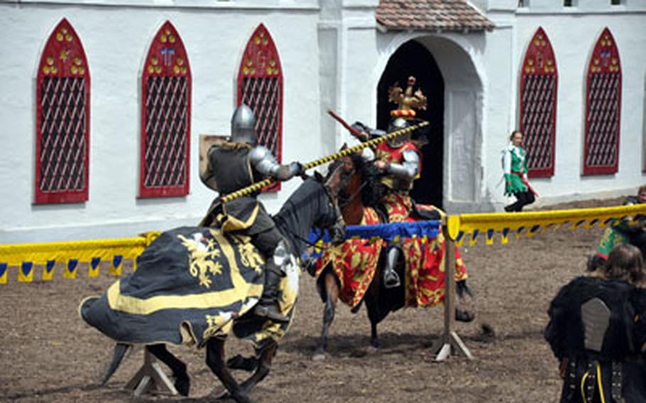 Knights collide in a jousting competition during a show at Castle Thurn.