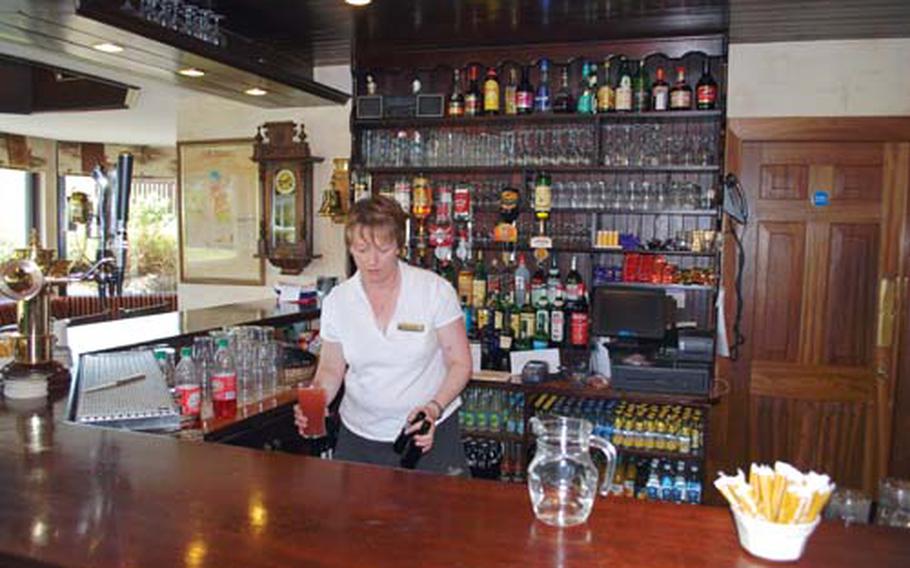 The bar at Dooks Golf Club, Ireland, offers a cozy ambience.