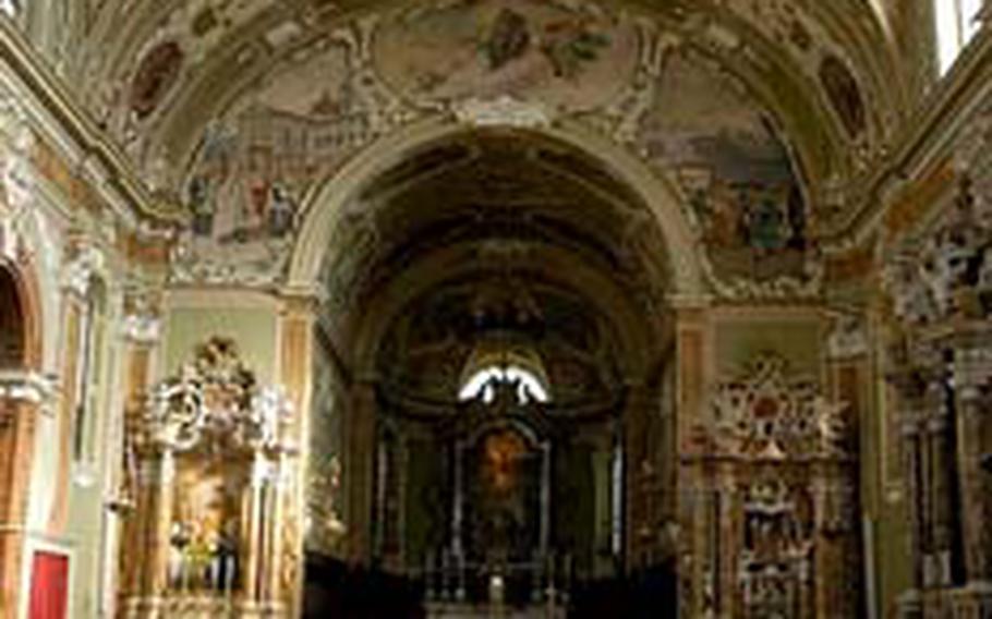 Chiesa San Marco’s exterior is exceptional only for its salmon color. But the inside of the church in Rovereto is full of ornamentation and color.