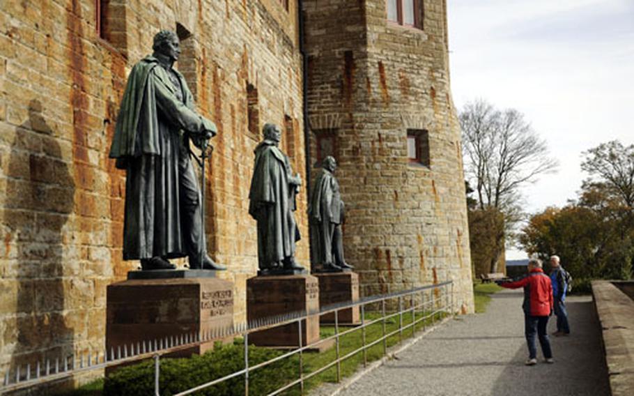 Statues of the rulers of Germany surround the perimeter of Hohenzollern Castle. The castle was first used as a seat of power in the 11th century.