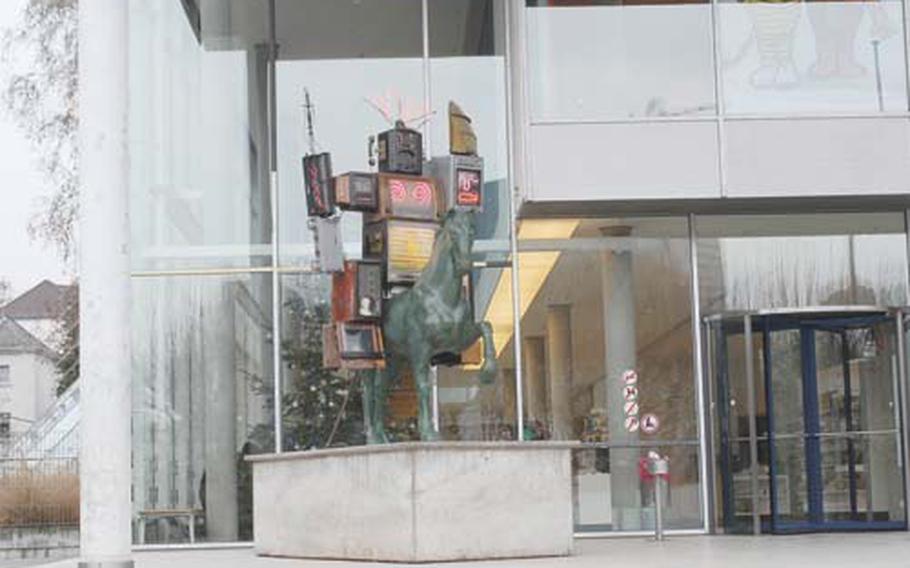 The Museum für Kommunikation is easilly recognized by its glass facade and the unusual horse-riding robot sculpture at its entrance. The museum is located on the Main River.