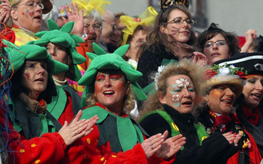 Women sing during the Weiberfastnacht, or women’s carnival, in Cologne. The celebration opens the final days of carnival partying on the Thursday before Fat Tuesday, also known as Mardi Gras.