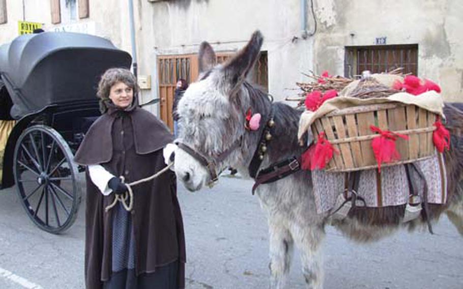 Even donkeys get decked out for the Valentine festivities during the the 2009 Festo di Poutoun, or the festival of lovers and kissers, in Roquemaure, France. The festival held on the weekend closest to Feb. 14, honors St. Valentine, the the patron saint of lovers, and his relics, which are supposed to protect the surround vineyards.