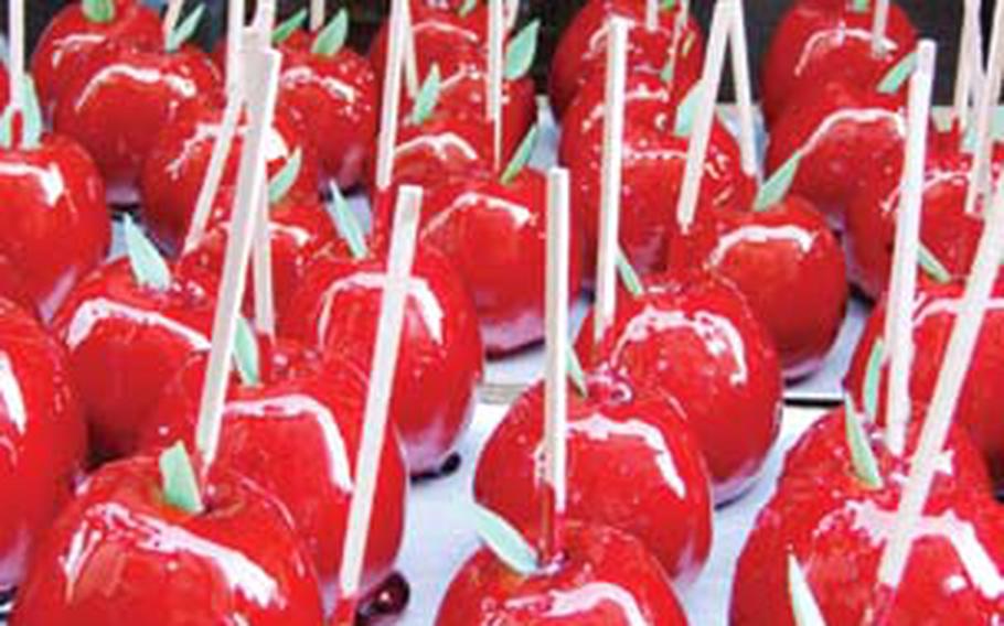 Candy apples are just one of many culinary treats for sale.