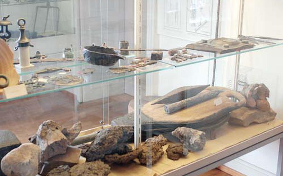 The museum’s artifact collection includes tools, keys and other items unearthed in the nearby ruins. The three-story museum also includes 18th-century art as well as a video that shows what life was like in the village before it was destroyed.