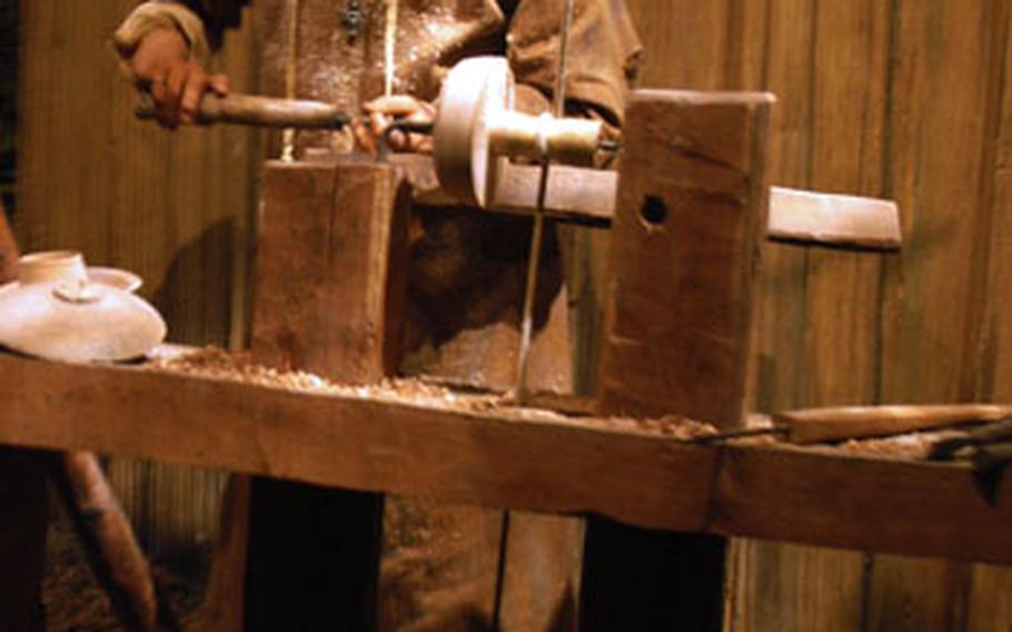 A mannequin portrays a wood turner at the Jorvik Viking Center in York, England. Artifacts from the 10th century were uncovered in 1979 during a construction project in the city&#39;s center. More than 40,000 artifacts were discovered during the five-year dig.