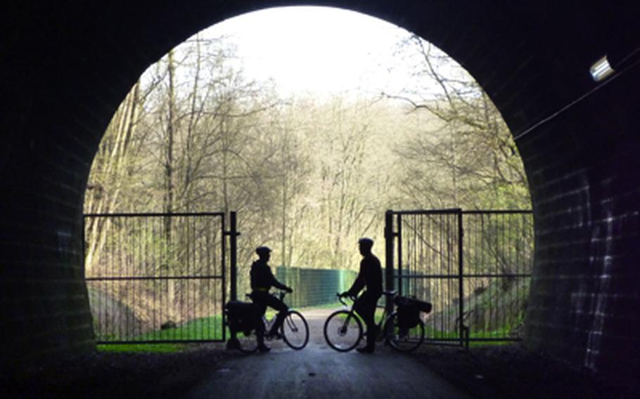 Cyclists take a break in a tunnel on the Glan-Blies-Weg, a cycling and hiking path in western Germany that was used during a repeat cycling trip from Ramstein Air Base, Germany, to  Sarreguemines, France.