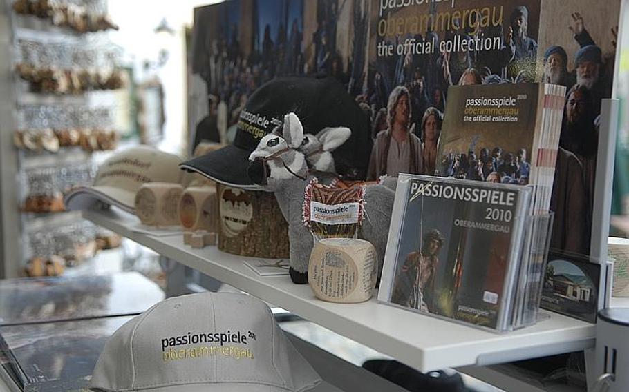 The 2010 Oberammergau Passion Play is a religious drama, but it's also a commercial venture that floods the town of 5,000 every 10 years with milllions of eurso in revenue. Shopkeepers sell play souvenirs, and many keep their stores open late and on Sundays to benefit from the influx of tourists.