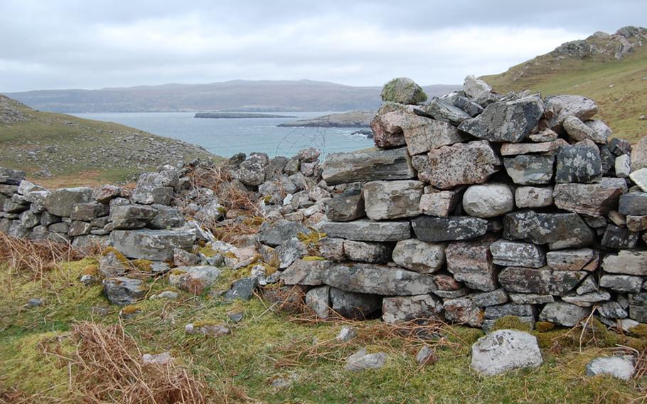 Stone remains show where a family cottage once stood at the Badbea Clearance Village near Wick, Scotland. Many tenant farmers were forced to leave their lands so their landlords could turn them into grazing areas for the more profitable sheep industry. The Clearance not only emptied much of the Highlands, but also killed much of the region's Gaelic culture.