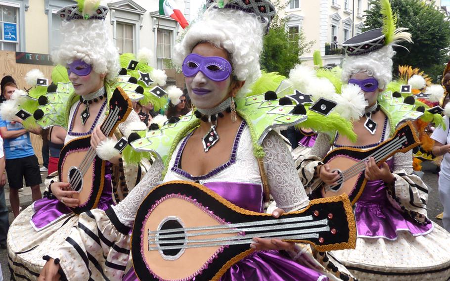 Although the Notting Hil lCarnival has a Caribbean theme, it didn't stop this group from dressing up like Mozart's mistresses at the 2009 event.