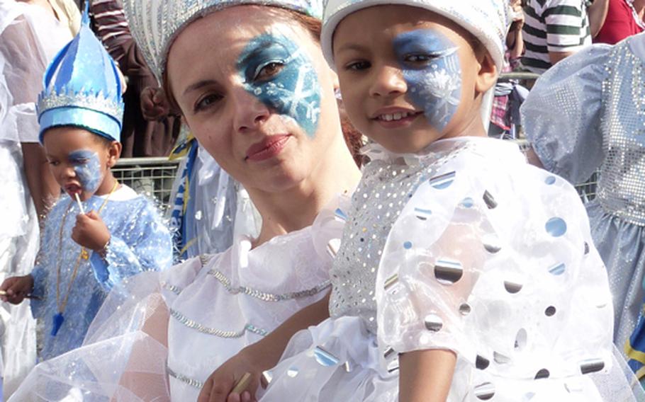 Saturday is traditionally Children's Day at the Notting Hill Carnival, but that doesn't keep the little ones from participating in the parade on Monday where about 50,000 people participate in the festivities that draw more than 2 million people for the two-day event. 