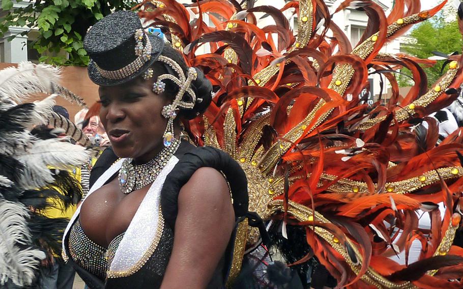 A flamboyantly dressed marcher shows her colors during the 2009 Notting Hill Carnival. 
